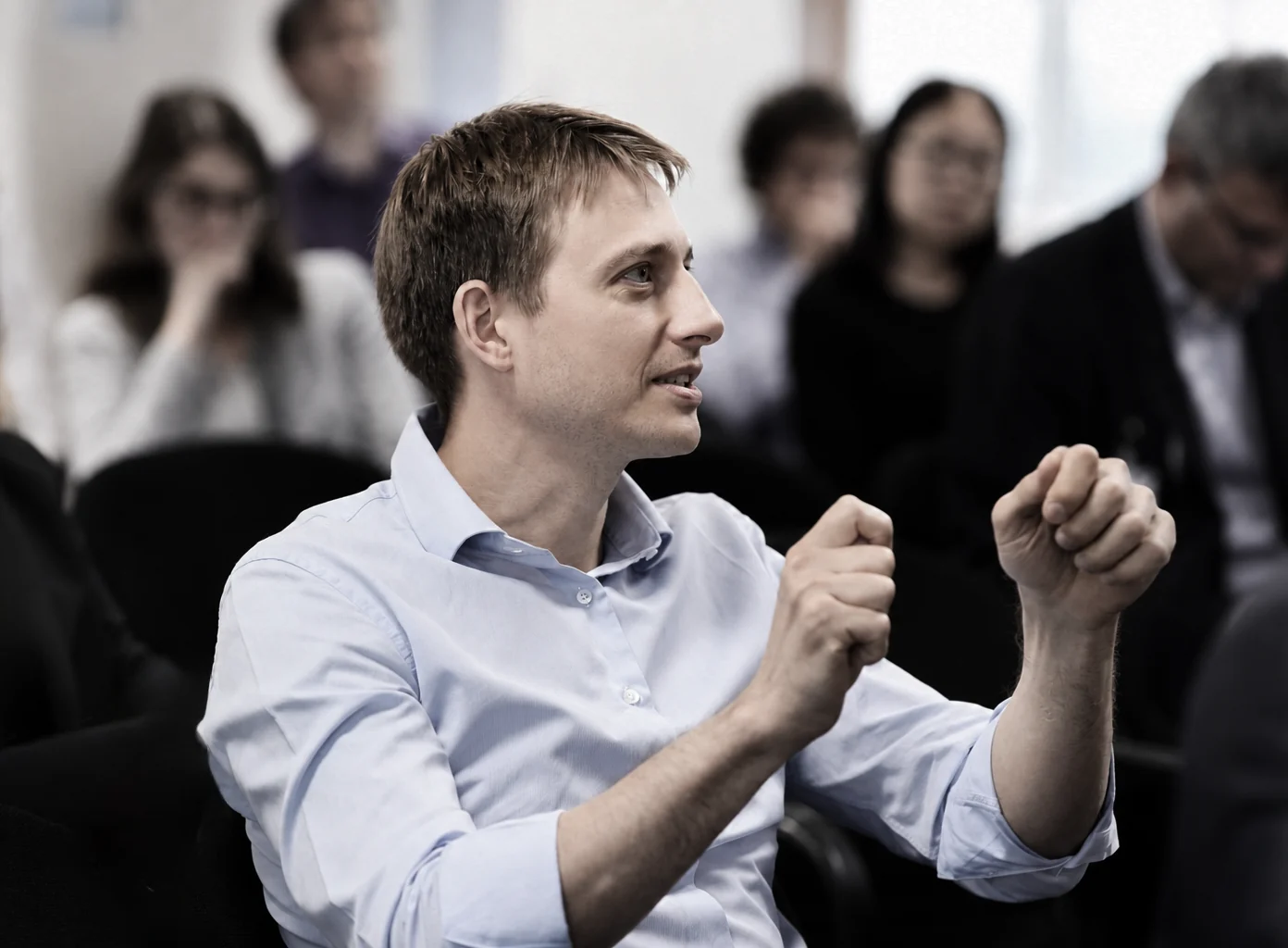 Igor Makarov speaking at an academic event